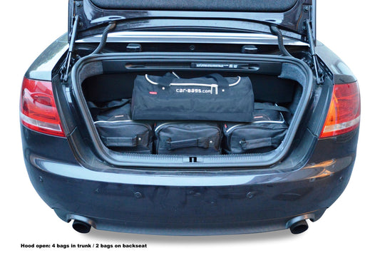 Reistassenset Audi A4 Cabriolet (B6) 2001-2004 (Met de cabriokap open passen er 3 trolleytassen en 1 reistas in de kofferruimte)
