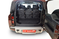 Reistassenset Land Rover Defender 130 (L663) suv 2020-heden (5 zits, 8 tassen)